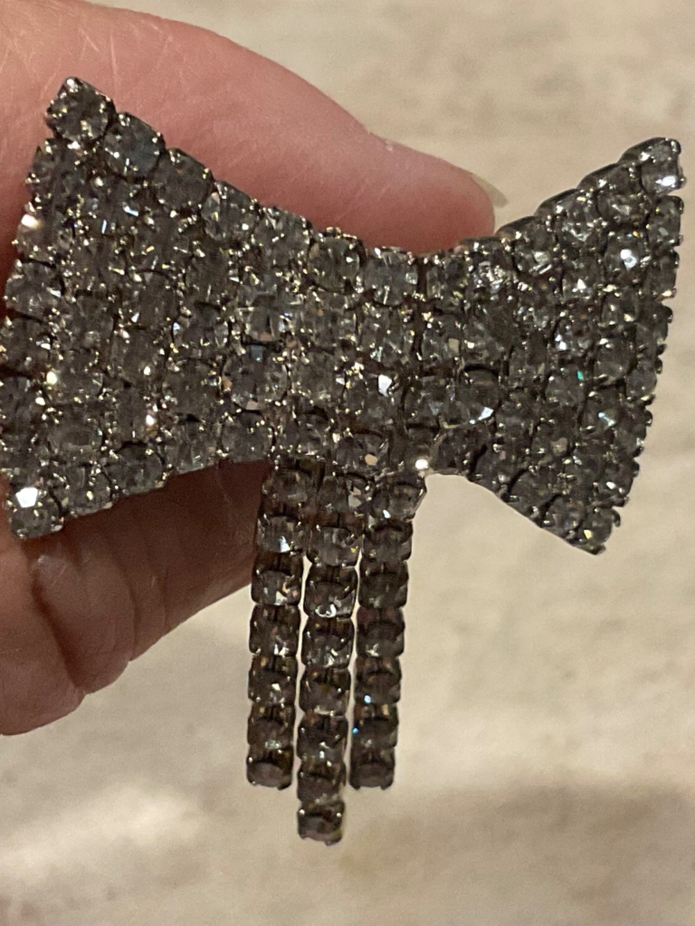 Vintage Rhinestone Bow Brooch Silvertone setting 1.5”